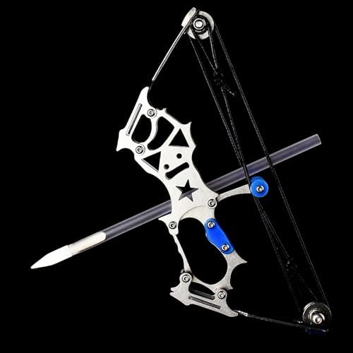 Mini crossbow set on a black background with an arrow nocked and ready