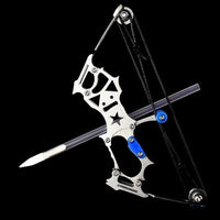 Mini crossbow set on a black background with an arrow nocked and ready